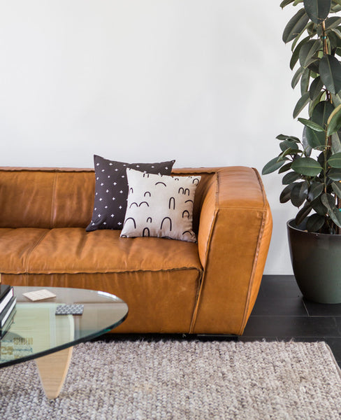 Hills + Valleys Linen Pillow on a modern sofa