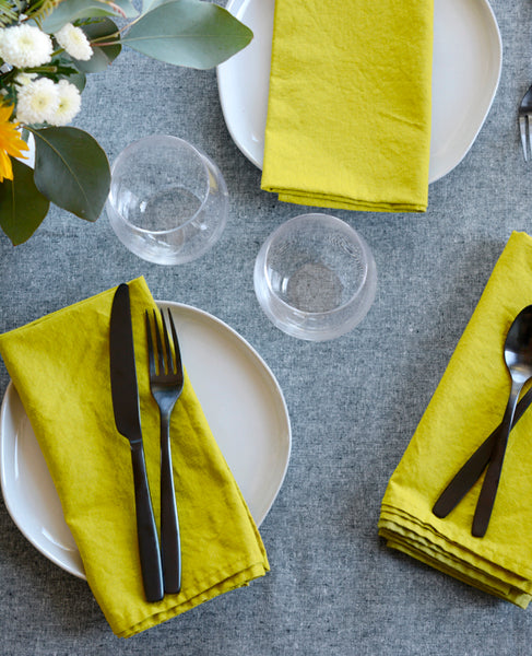 Modern dinner table set with linen napkins from Cotton & Flax