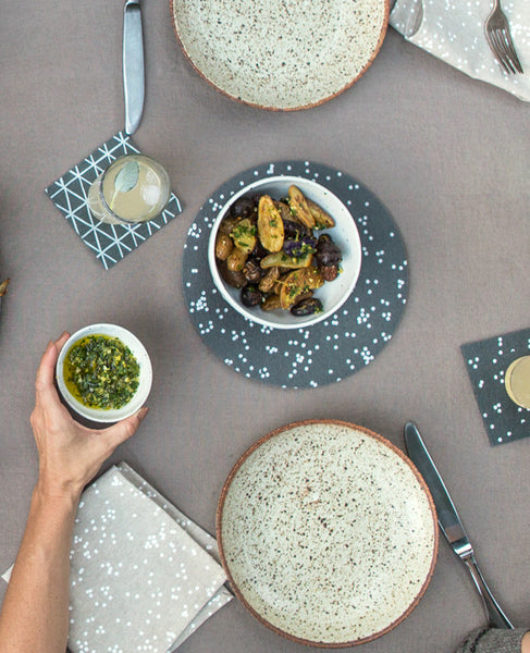 Dinner table set with Grey Confetti Trivet and Grey felt coasters from Cotton & Flax