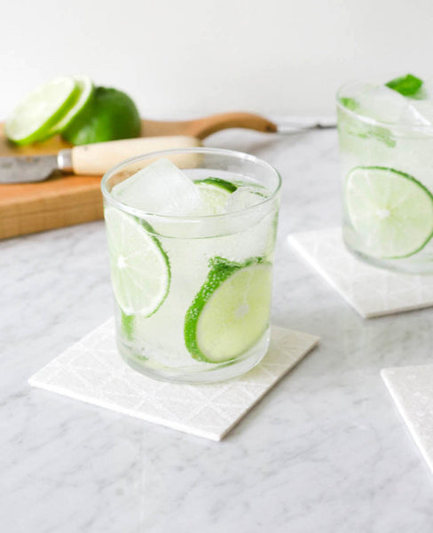 Modern coasters with spring cocktails