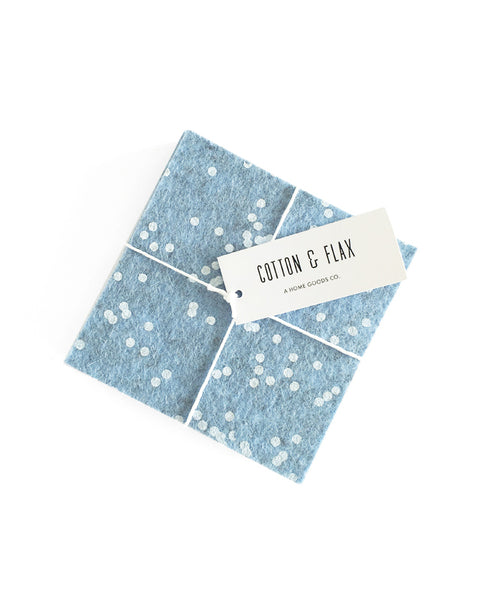 Ice blue wool felt coasters packaged with twine and a Cotton & Flax tag