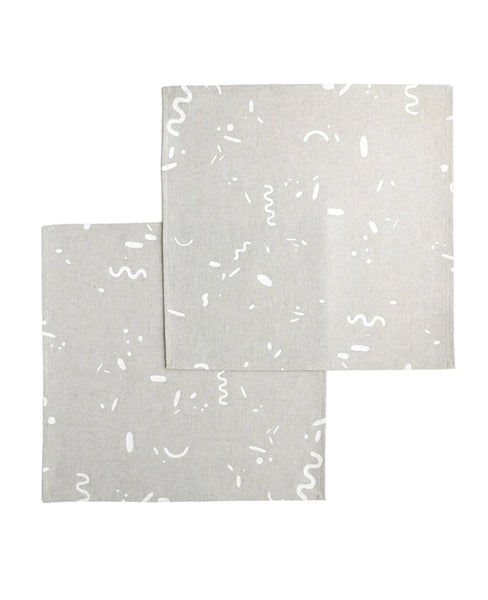 Linen cocktail napkins with a confetti squiggle pattern